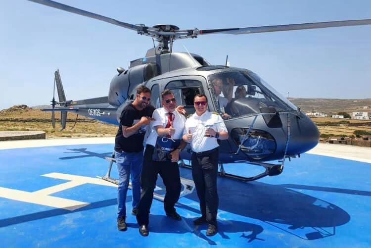 Guides in front of a helicopter