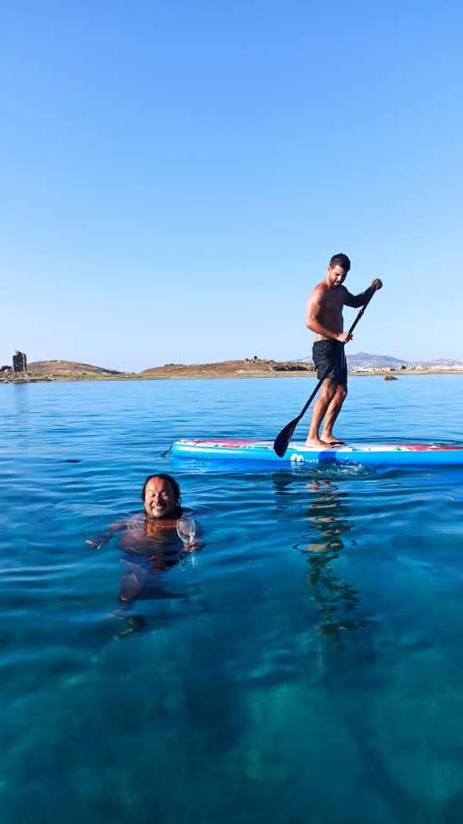 People swimming and enjoying the sea after a yacht ride